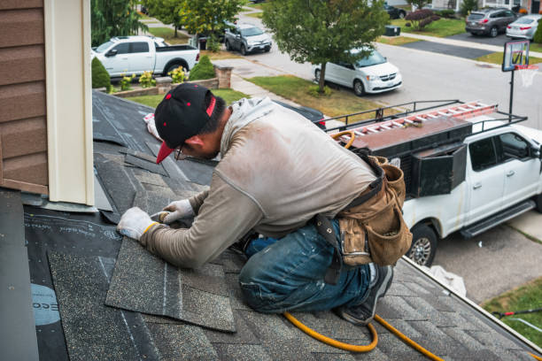 Professional Roof Replacement technician working in Bridgeport, NY